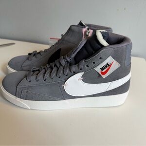 Nike Women’s Gray High-Top Sneakers.